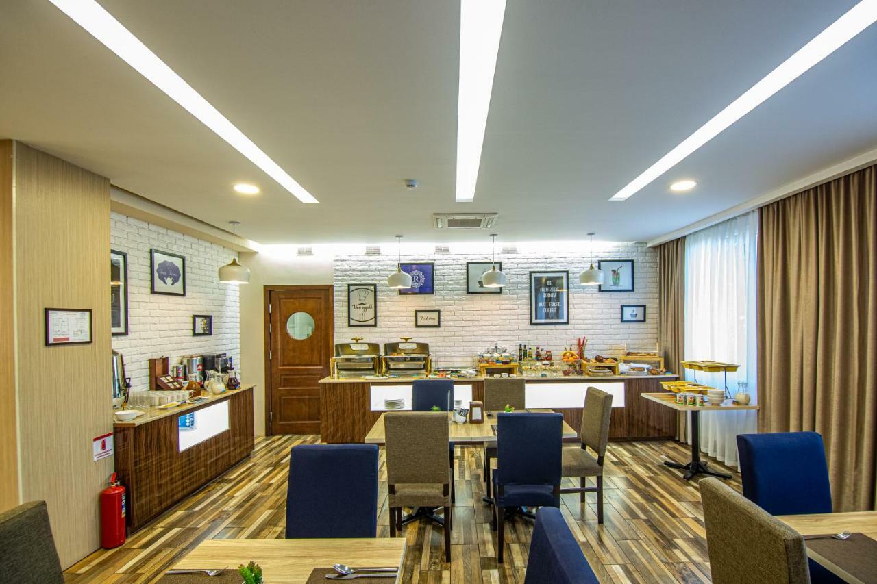Rayan Hotel Oš Esterno foto